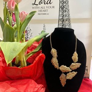 Gold-tone leaf-shaped earrings